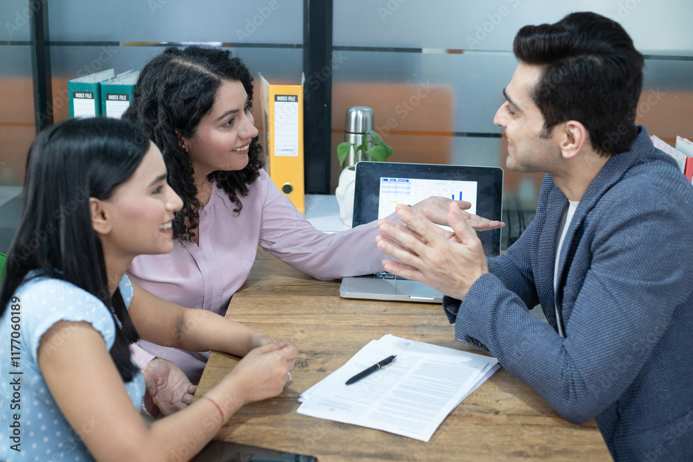 Business Man Talking To His Colleagues On Meeting In The Office Business Man Talking To His Colleagues On Meeting In The Office