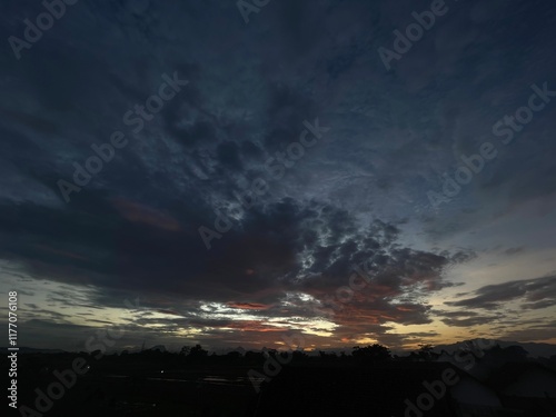 Dramatic afternoon sky with beautiful cloudy natural gradations in the background photo