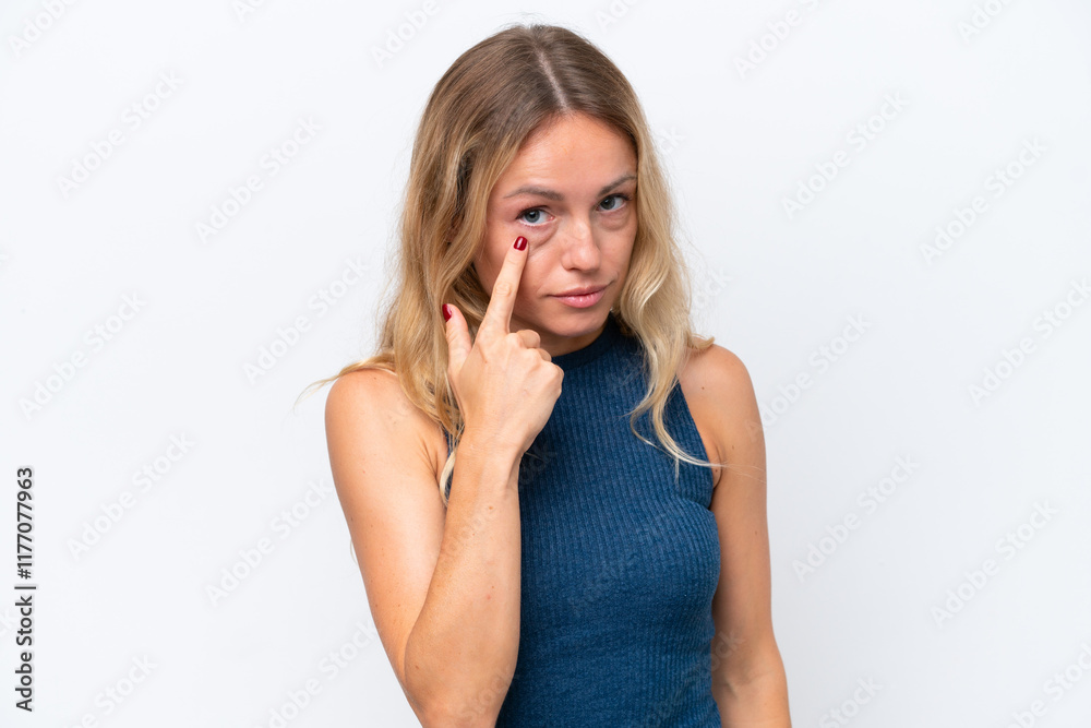 Young Russian woman isolated on white background showing something Young Russian woman isolated on white background showing something