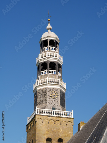 Tower of Grote Kerk church in old town of Hindeloopen, Friesland, Netherlands photo