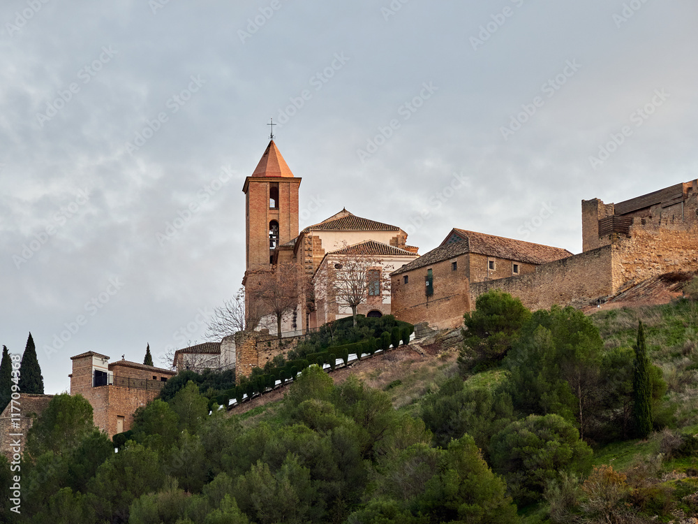 Iznajar village. Mountain village surrounded by the Iznajar Reservoir. Parish of Santiago Apostol. Iznajar Castle Iznajar village. Mountain village surrounded by the Iznajar Reservoir. Parish of Santiago Apostol. Iznajar Castle