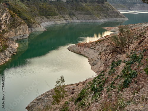 Iznájar Reservoir. The largest reservoir in Andalusia. Green water. Effects of drought.