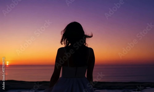 A woman standing on a cliff overlooking the ocean at sunset, her dress flowing in the wind