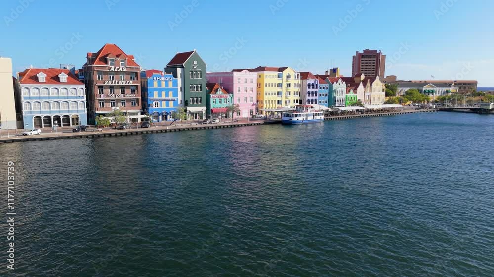 Aerial angled approach of colorful buildings in the Punda District, Willemstad, Curacao, near the waterfront Aerial angled approach of colorful buildings in the Punda District, Willemstad, Curacao, near the waterfront