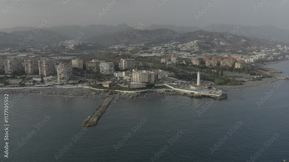 Torrox Lighthouse seen from a drone - Malaga Spain Torrox Lighthouse seen from a drone - Malaga Spain