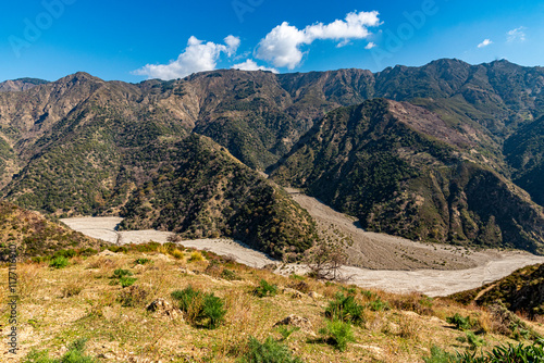 Vista della fiumara Amendolea tra i monti verdi photo