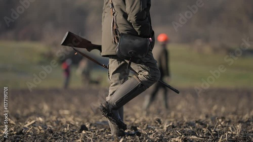 Hunters are hunting game in winter.