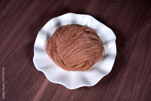 Yunnan special food Jianshui County red rice noodles photo