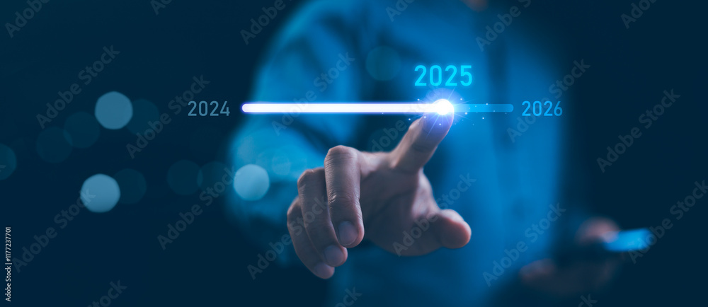 Businessman touch on loading progress from 2024 to 2025, Planning and challenge strategy in new year 2025 Concept. New business startup in 2025. 2025 is loading to 2026, calendar date, end of the year