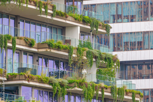 Photography Luxury apartment towers in the Amsterdam Zuidas area with hanging plants