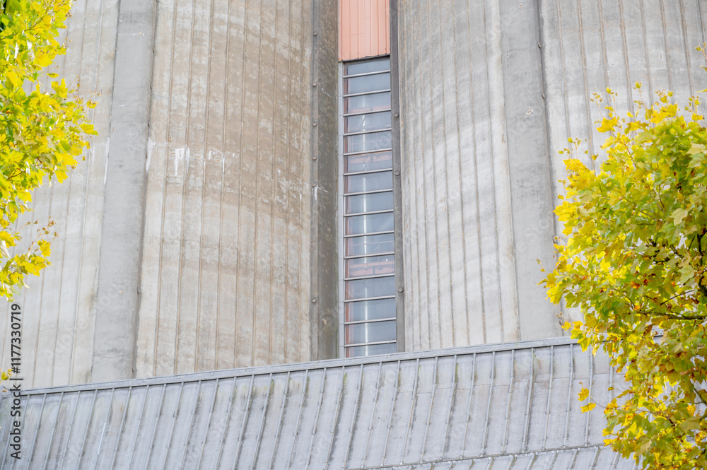 Concrete building with vertical lines.