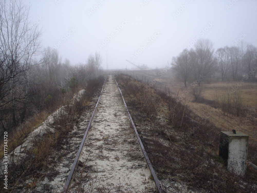 Abandoned railway. End of the road. Dead end.  Landscape, fog.