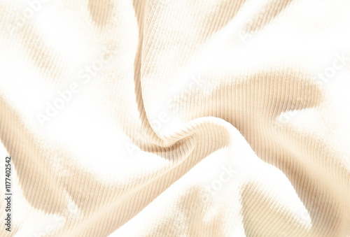 Cream-colored ribbed fabric texture. Soft, luxurious, and elegantly draped material. Perfect for fashion, textile, or design projects.