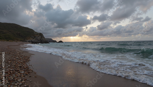 Serene beach at sunset with gentle waves, nature's tranquility photo