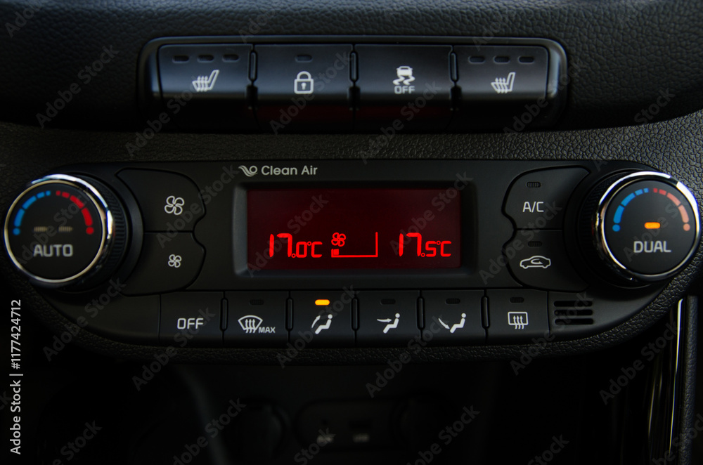 Car climate control panel display showing temperature settings Car climate control panel display showing temperature settings