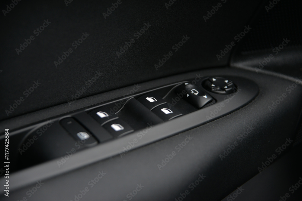 Close up of car's power window and lock controls Close up of car's power window and lock controls