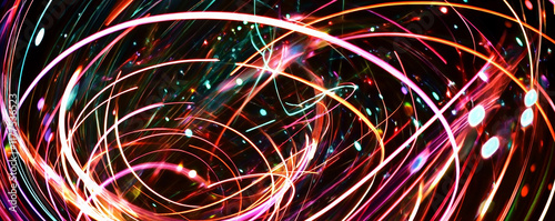 Colorful light trails creating abstract patterns in the dark