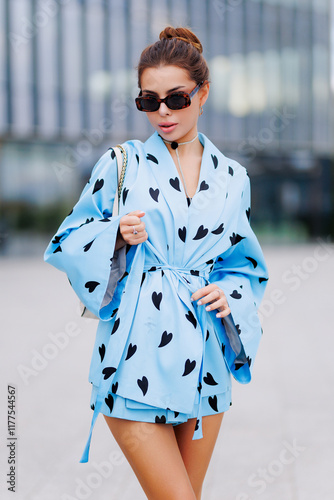 Stylish woman in a blue suit