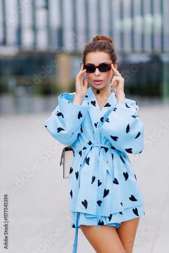 Stylish woman in a blue suit
