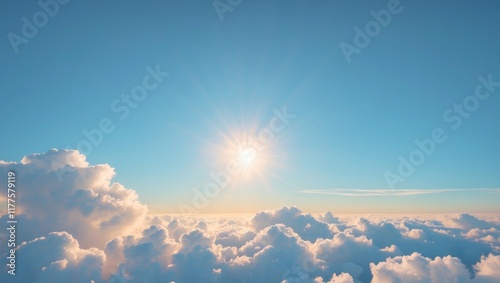 Bright sun shining over fluffy white clouds in a clear blue sky