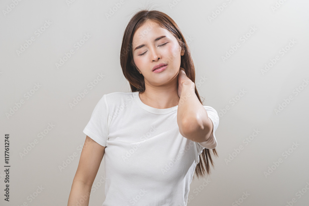 Pain body muscles stiff problem, asian young woman, girl painful with neck pain body ache from work, holding massaging rubbing shoulder hurt, sore on white background. Health care and medicine concept Pain body muscles stiff problem, asian young woman, girl painful with neck pain body ache from work, holding massaging rubbing shoulder hurt, sore on white background. Health care and medicine concept