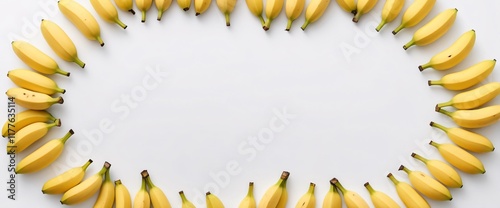 Banana Frame: A vibrant, cheerful arrangement of mini bananas forming a whimsical oval frame against a clean backdrop. Perfect for adding a touch of playful energy to your designs.  photo