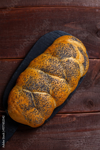 Traditional Jewish holiday challah homemade on table photo