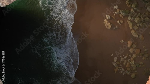 aerial view of Benagil Algarve beaches, portugal during sunset