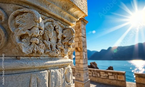 Ornate column, coastal view, sunny day, travel