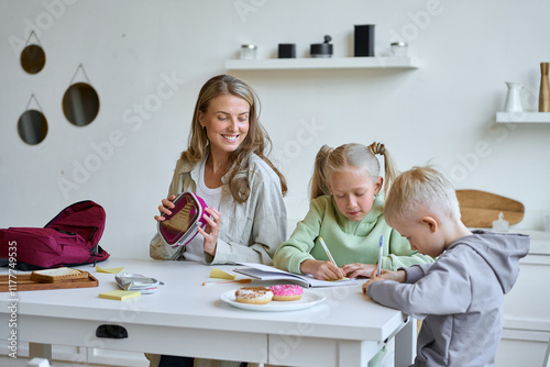 Morning School Routine: Mom Prepares Kids for School photo