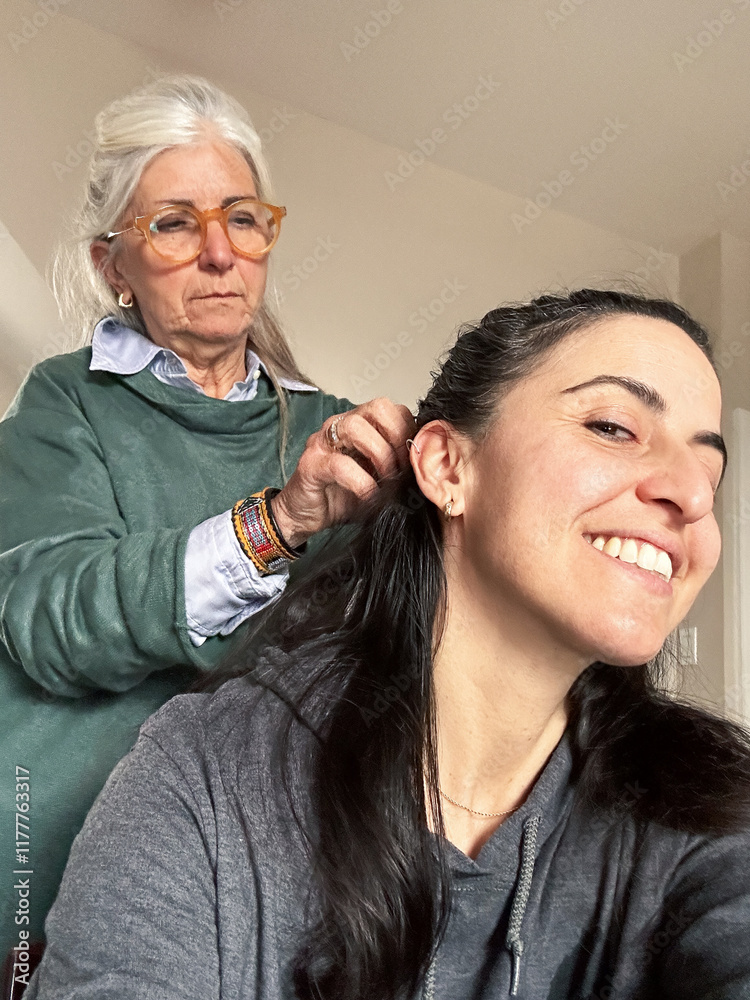 © tessy morelli/Stocksy - UGC POV candid home care mother and daughter
