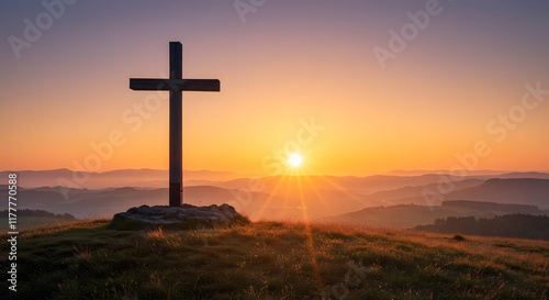 Sunrise casting golden rays over wooden cross on hilltop symbolizing hope and victory in resurrection of Christ