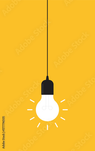 Hanging light bulb on yellow background