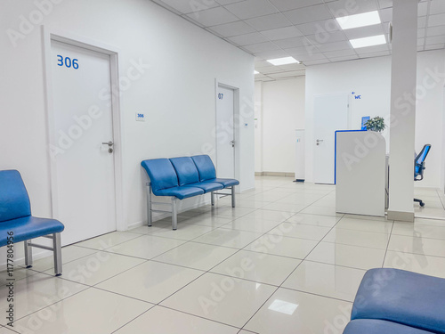 Blue Waiting Room Chairs in a Medical Office Corridor