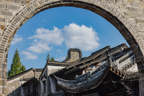 Traditional Architecture Framed by Stone Arch photo