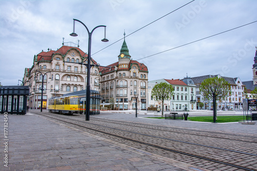 Oradea  Transylvania with tram station in Union Square cityscape in Romania photo