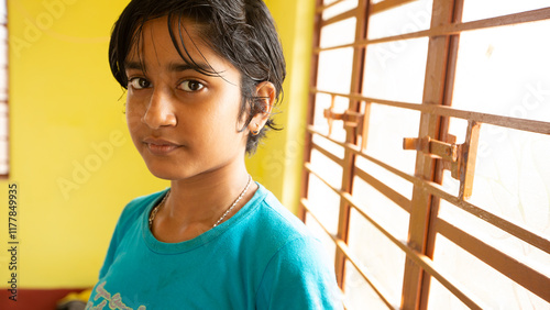 Portrait of a teenage girl looking at camera