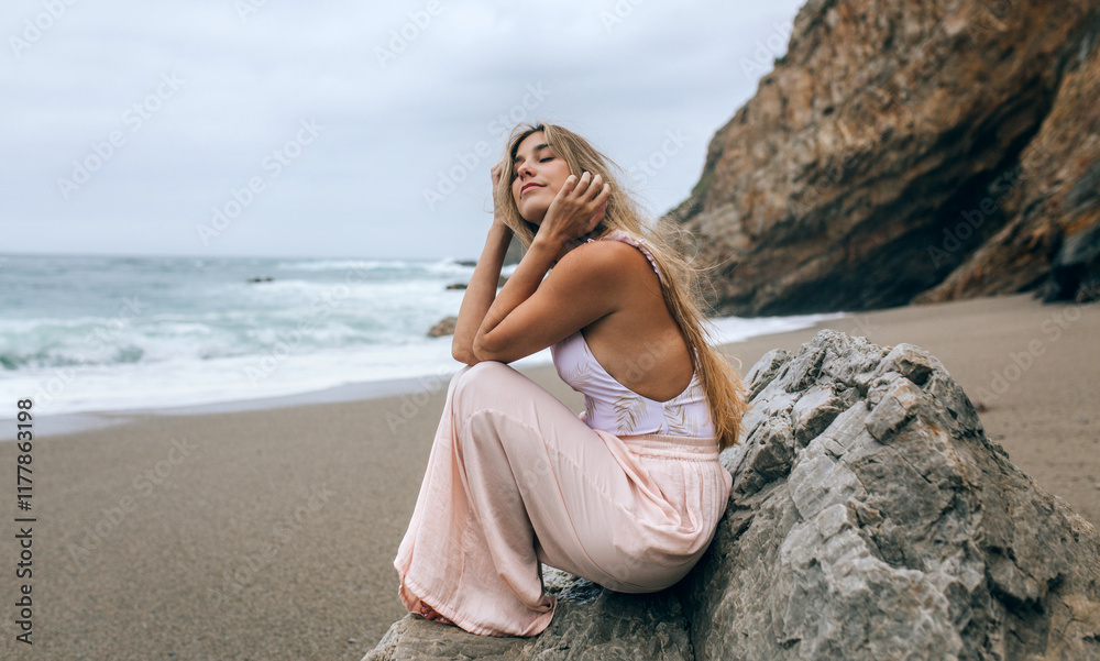 Woman Reflecting on Beach