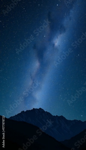 Starry Night Over Majestic Mountain Peaks