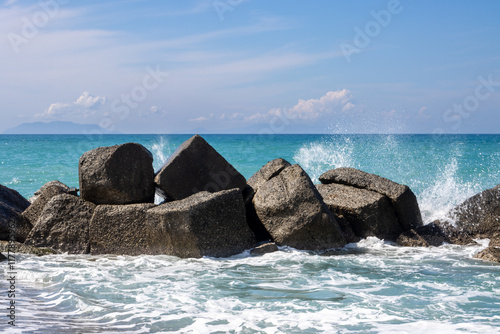Fototapeta Naklejka Na Ścianę i Meble -  Sand beach with breakwaters, Spadafora, Sicily, Italy