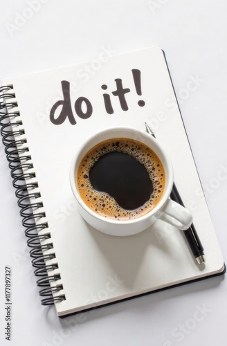 A cup of black coffee rests beside an open notebook on a flat surface. The notebook's page features a motivational phrase encouraging productivity and action in daily life.