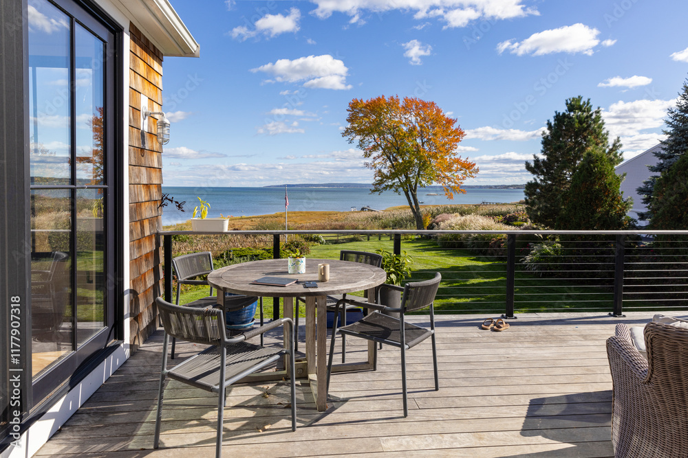 Tablet computer on table exterior view of coast 