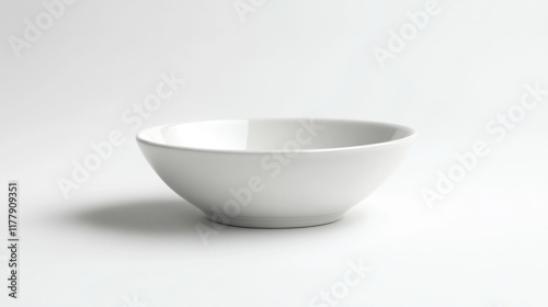 Simple white ceramic bowl on white background.