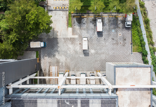 Aerial View of Company Parking Area with Delivery Trucks photo