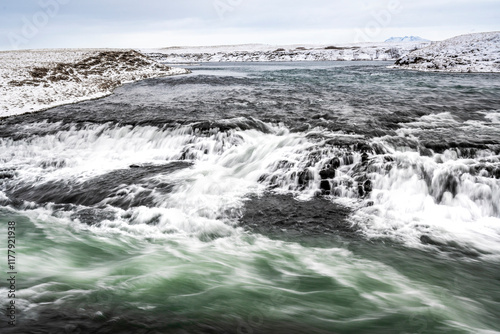 Wallpaper Mural long exposure ice winter Iceland water running waterfall Torontodigital.ca