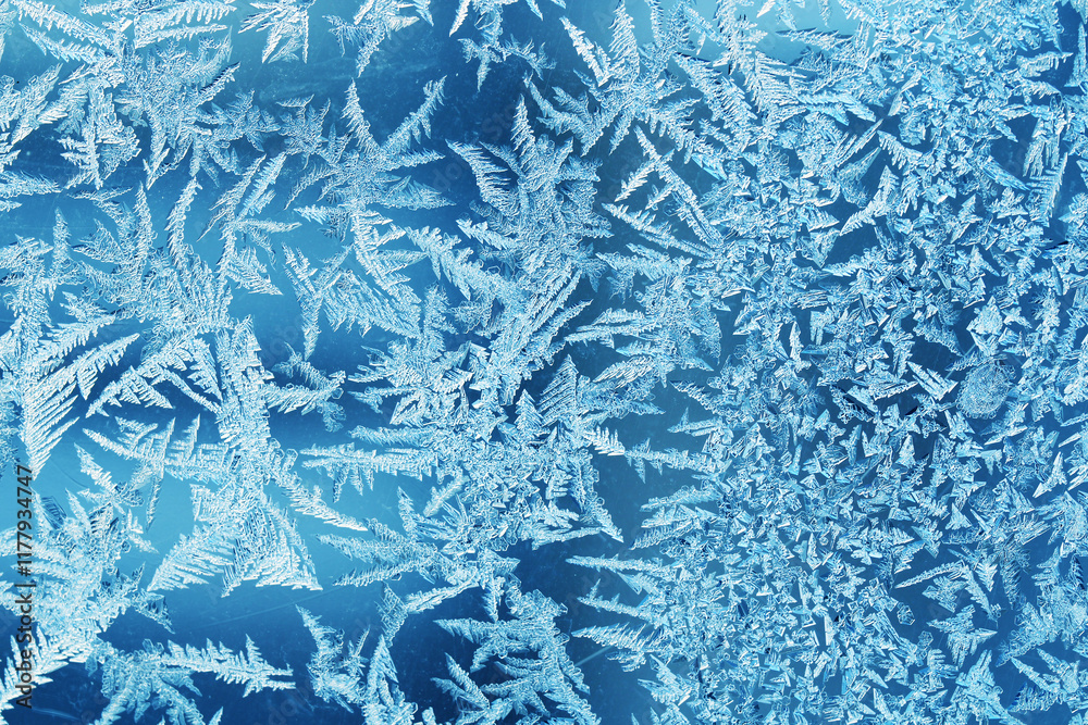 Abstract frosty pattern on glass, background texture Abstract frosty pattern on glass, background texture
