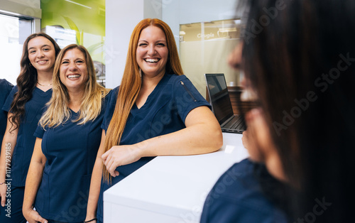 Team of Smiling Dental Professionals in Clinic Setting photo