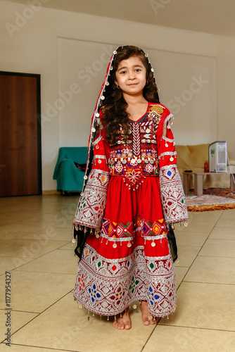 Afghan girl in traditional dress  photo