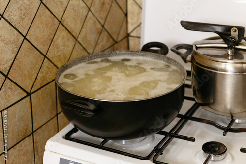 Rice is cooking in the pot photo