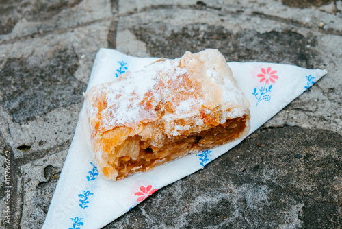 piece of Hungarian apple strudel on a paper napkin photo